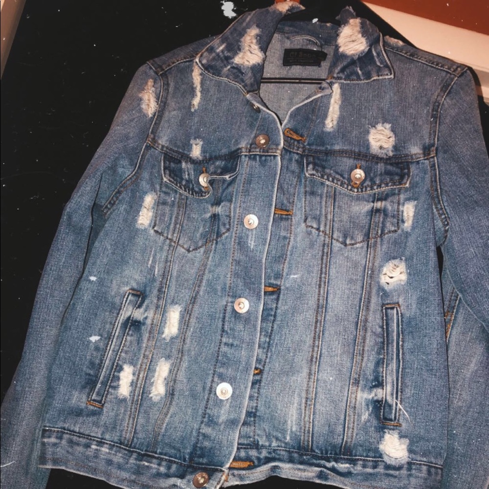 Distressed denim jacket